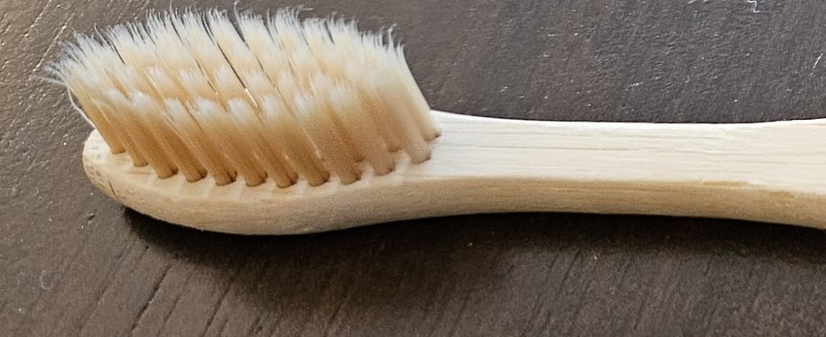 My bamboo toothbrush. An example of my commitment to sustainability.