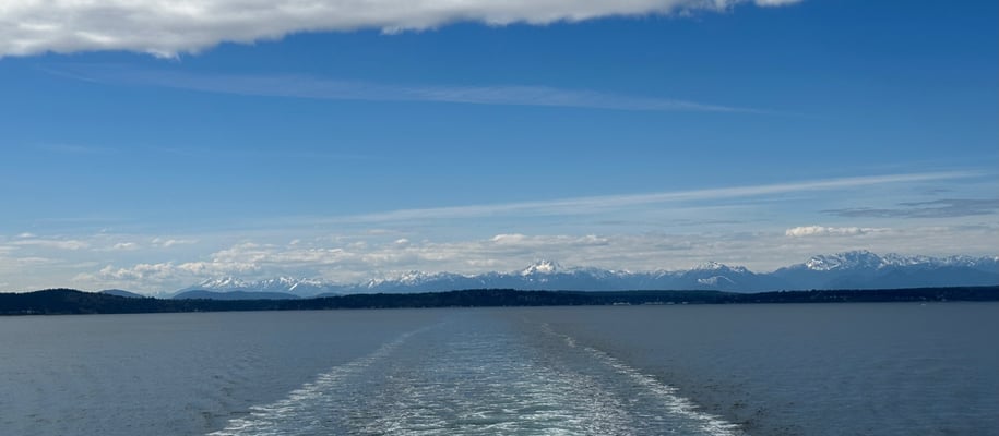 If you from a ferry in the Puget Sound facing the Olympic mountains