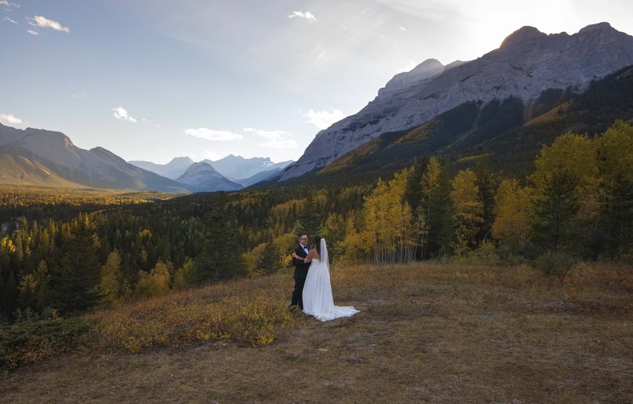 Couple getting wedding photos at Kananaskis village