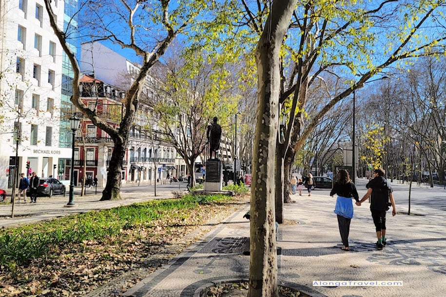 2 People enjoying  beautiful gardens on Avenida de Liberdade, adjusted to Parque Mayer