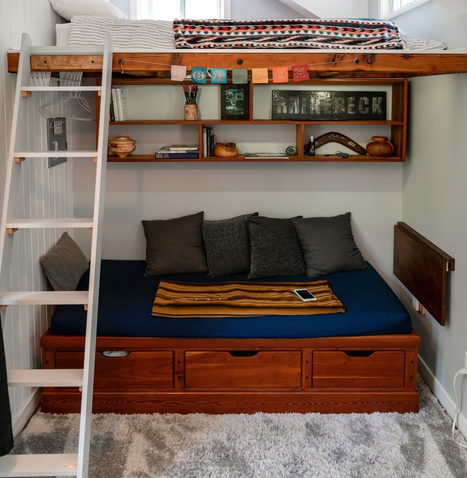 a lofted room with a lofted bed and a lofted bed