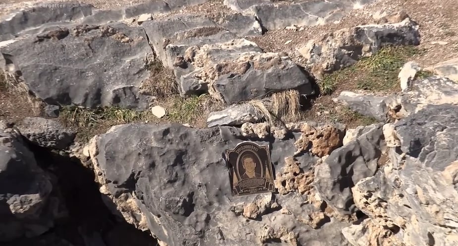 Sealed entrance with John's plaque