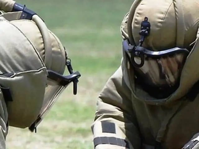 A Russian bomb squad defusing an explosive device