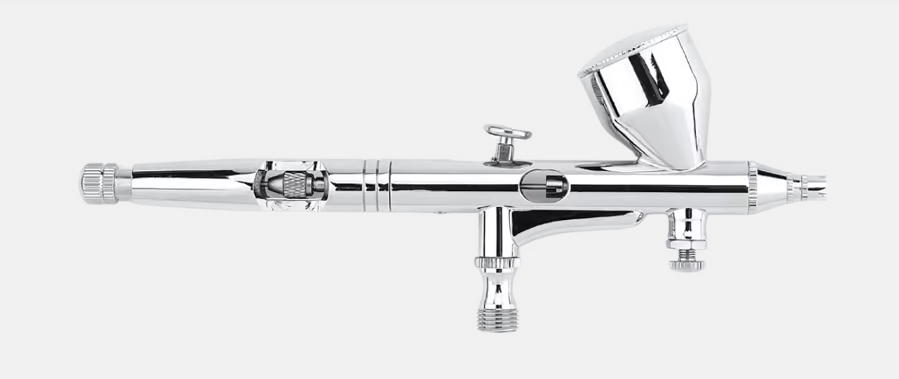 a chrome finish airbrush tattoo gun