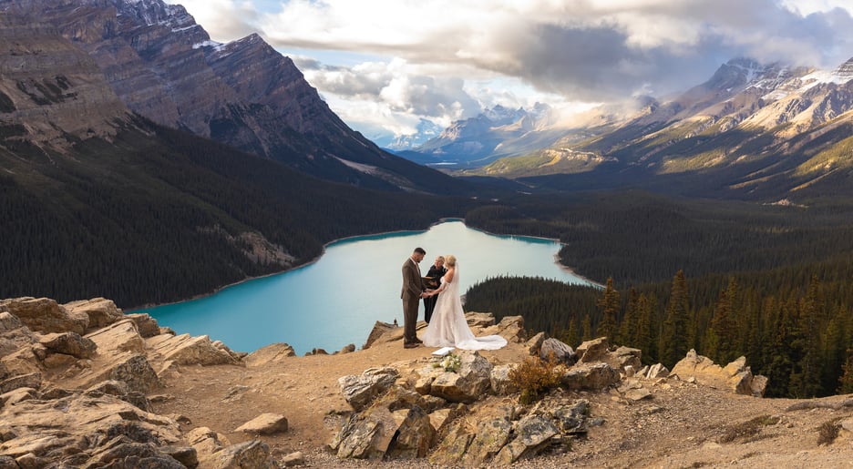 Bride and groom during their ceremony at peyto lake