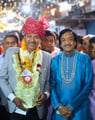Manohar Lal and the band with the host of an event.