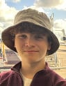 person in hat
