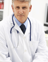 a male doctor in a white lab coat