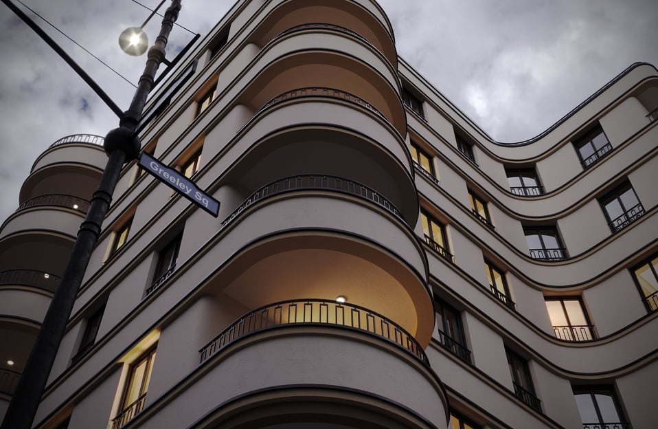 a tall building with a street light and a street light