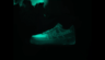 Frame from sneaker motion graphics - glowing canine graphic shoe