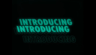 Scene from dark animation - introduction typography with neon glowing accents