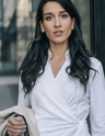 a woman in a white shirt