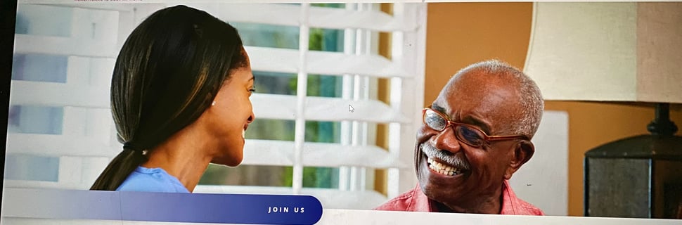 a nurse with a male African American  patient