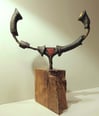 A clickable link leading to a page with further information about sculpture 'Of Torcs and Terrets'.