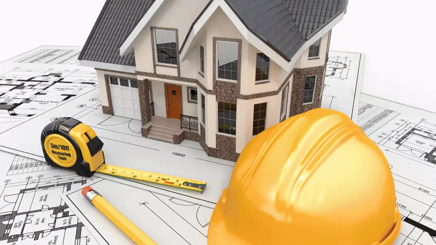 a group of tall buildings under a cloudy blue sky