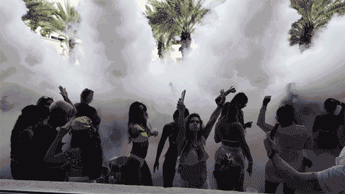 a group of people dancing to DJ Rico Sanchez at Daer Beach Club Hard Rock