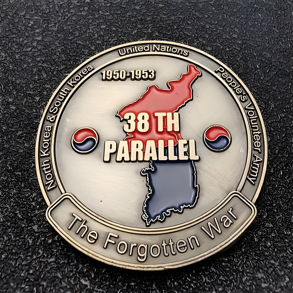 Collection of custom coins with gold, silver, and antique finishes for corporate gifts
