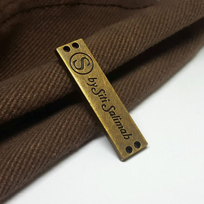 Custom metal brand logo