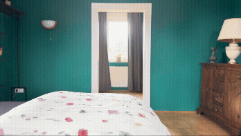 woman wearing yellow long-sleeved dress under white clouds and blue sky during daytime