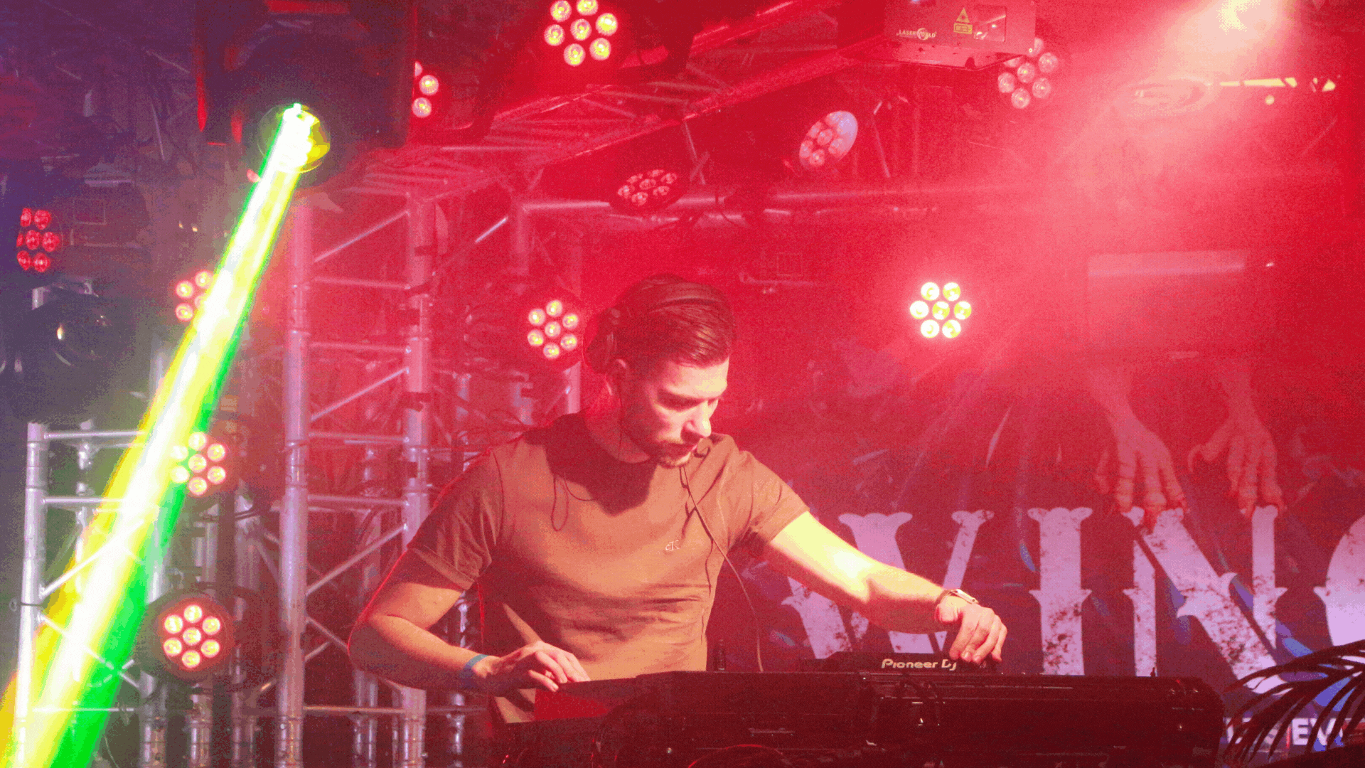 an abstract photo of a curved building with a blue sky in the background