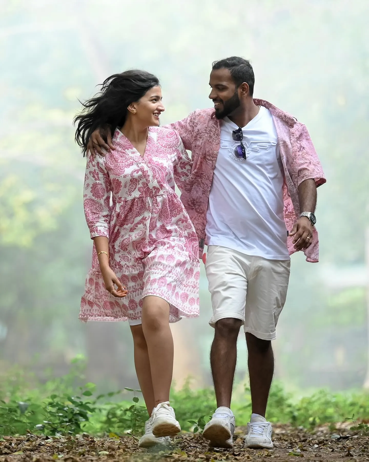 A romantic shot of a couple amidst nature in Palakkad for their pre-wedding story.