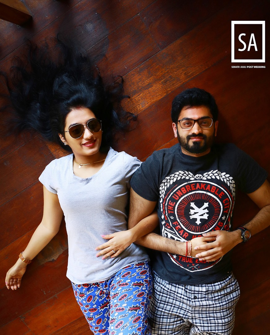Pre-wedding photography capturing the couple's reflection in water in Kerala.