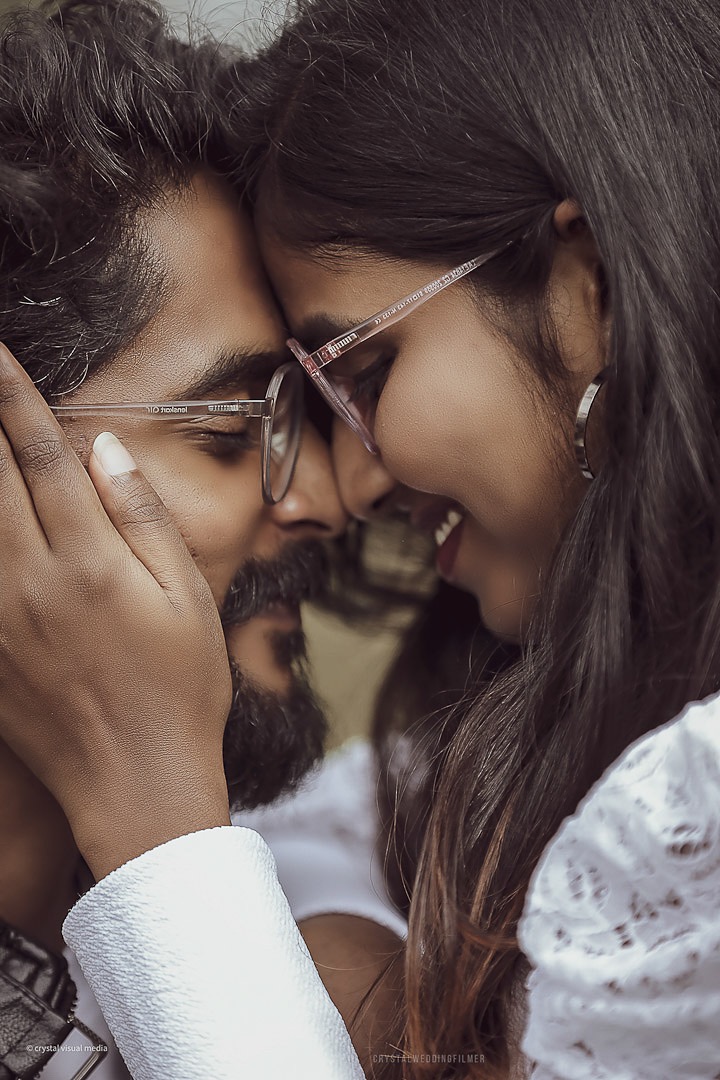 A close-up, romantic shot of a couple for their save the date in Kerala.
