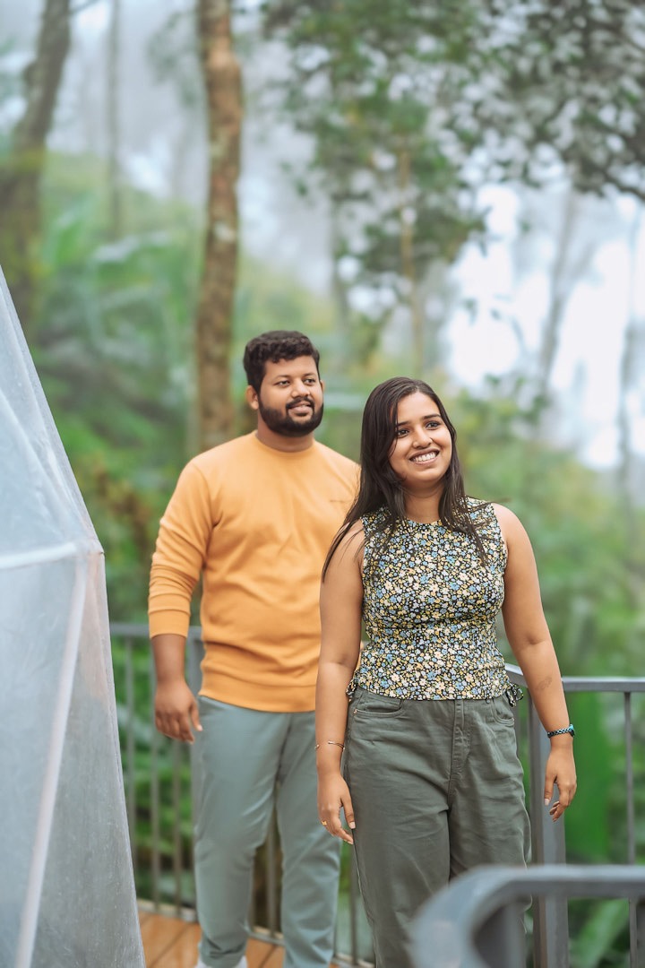 Dreamy pre-wedding photography in the misty hills of Vagamon, Kerala.