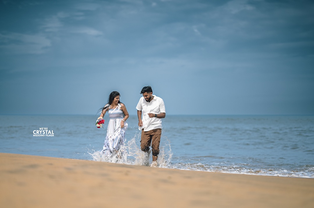 Couple sharing a laugh during their pre-wedding photography session in Kerala.