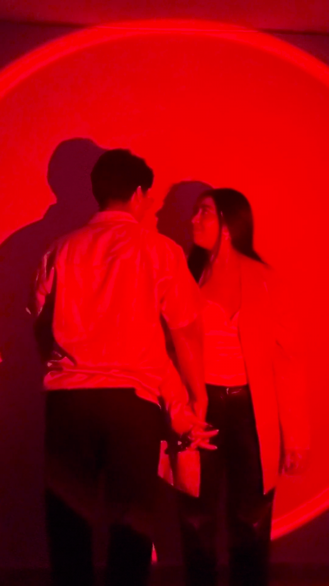 couple wearing silver-colored rings