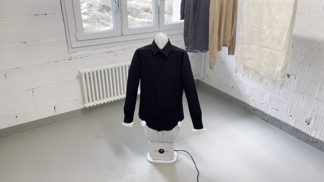 person wearing grey knit sweater