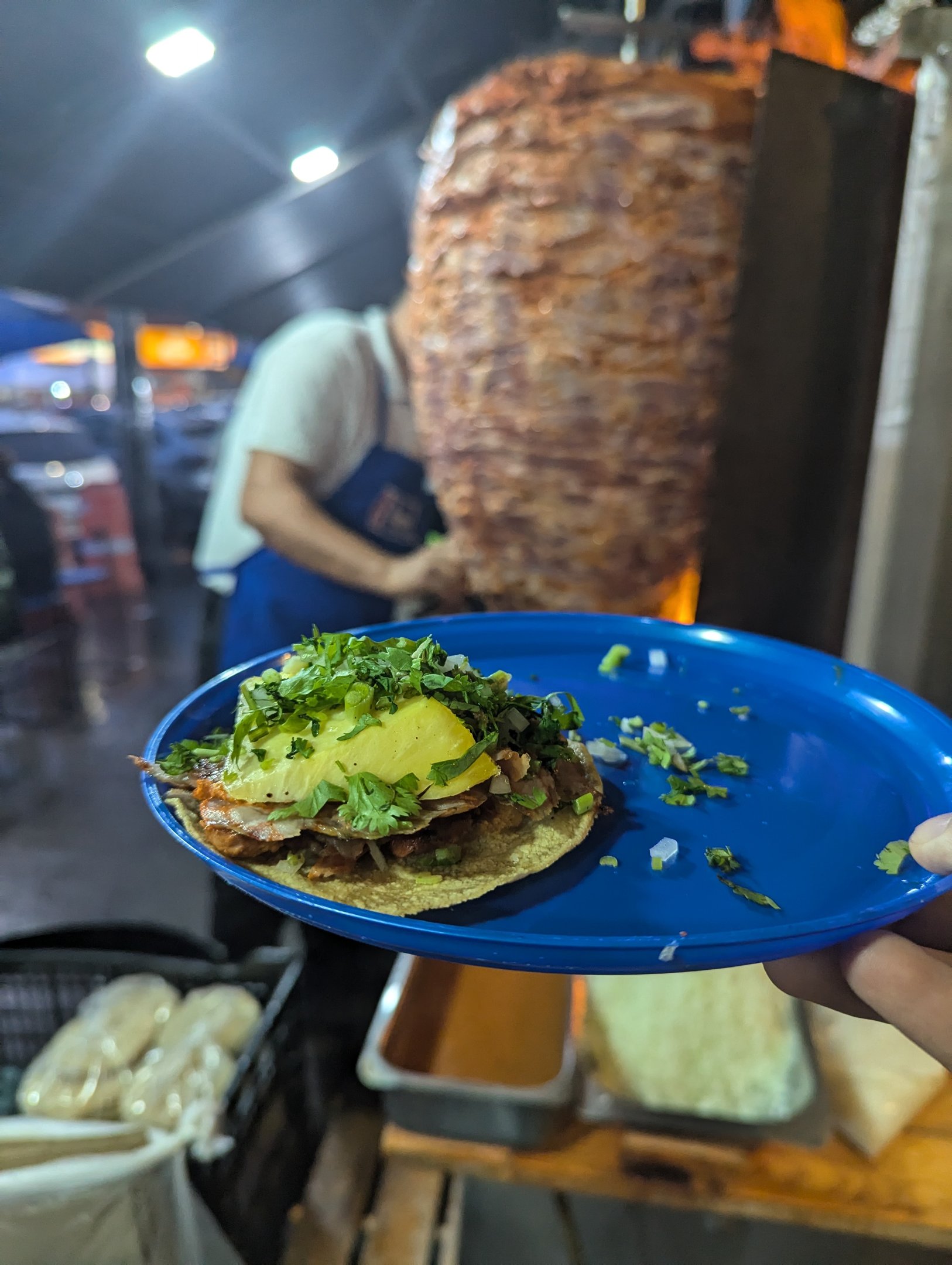 Fresh tacos al pastor on a street stand in Mexico City