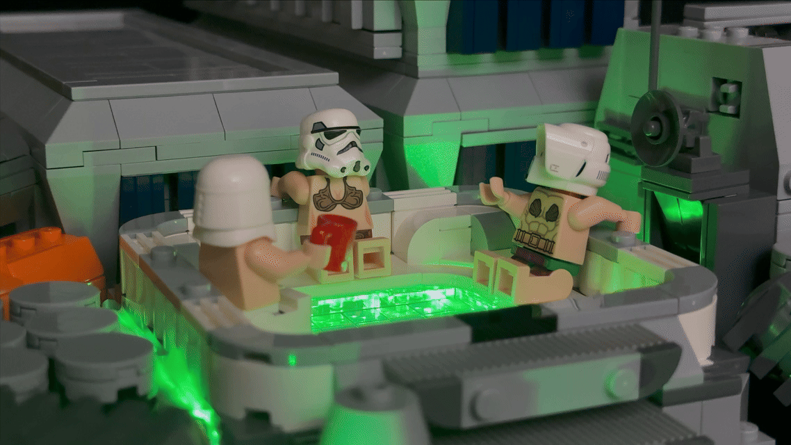 person wearing grey knit sweater