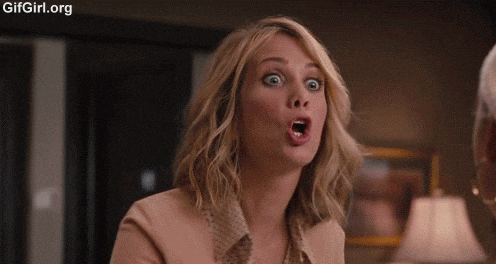 a gif of a woman doing the blowjob sign