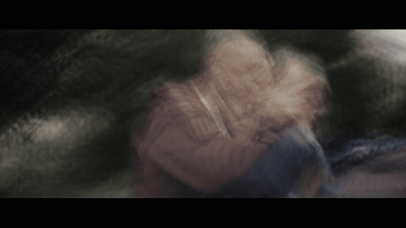 a man in a brown jacket is holding a white frisbee