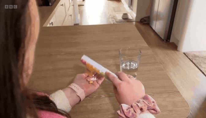 an abstract photo of a curved building with a blue sky in the background