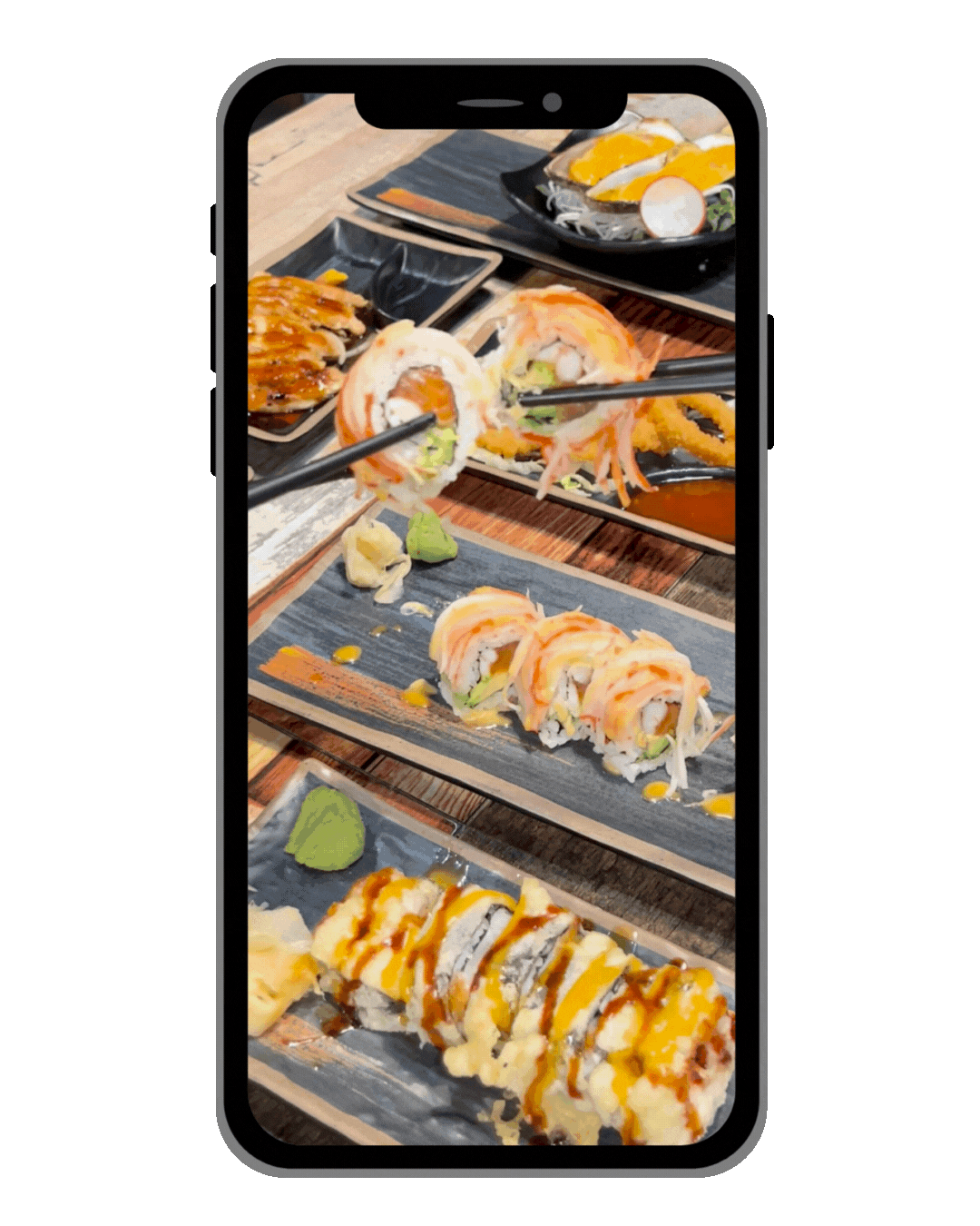 a phone with a sushi on the screen