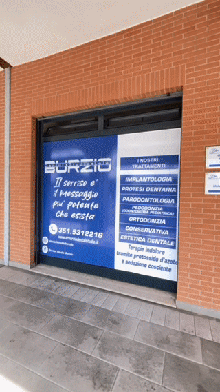 man and woman standing in front of brown concrete building during daytime