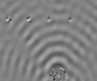 Lamb waves moving through a component showing defects in carbon fibre