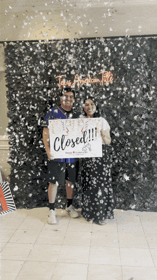 an abstract photo of a curved building with a blue sky in the background