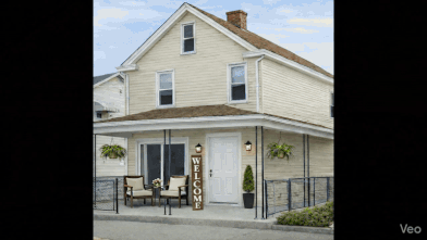 black and brown leather padded tub sofa
