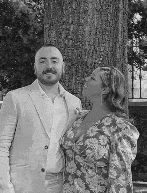 couple wearing silver-colored rings