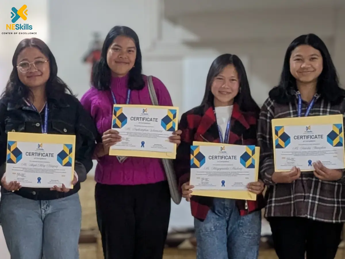 NESkills learner achievement moment with students holding certificates after communication training
