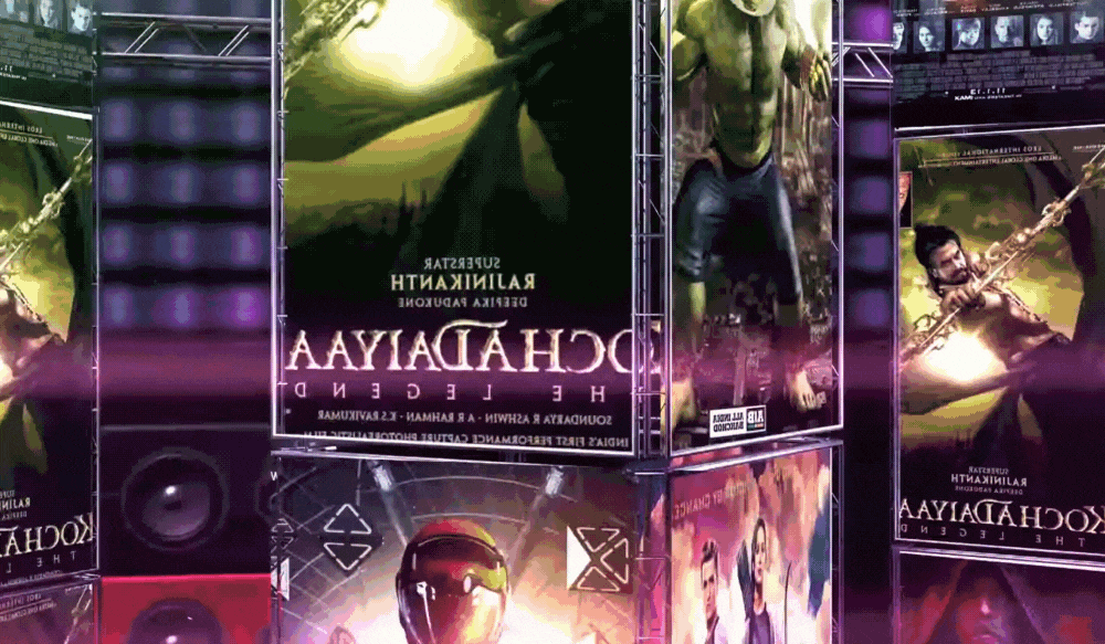 Digital display of Broadcast graphics and superhero graphics in a neon purple studio setting.